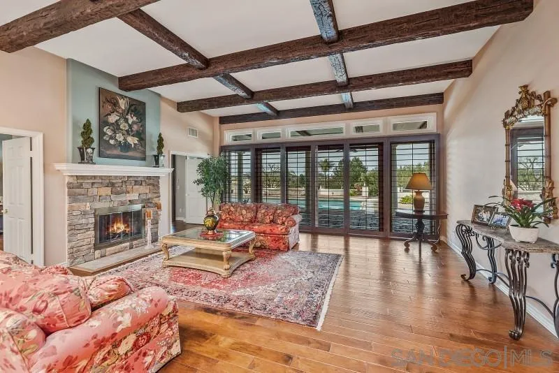 14370 Harvest Crescent Poway, CA 92064 - Photo 14 of 56 a living room with furniture and a fireplace