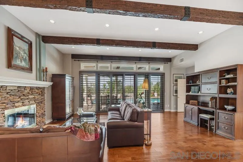 14370 Harvest Crescent Poway, CA 92064 - Photo 23 of 56 a living room with furniture and a fireplace