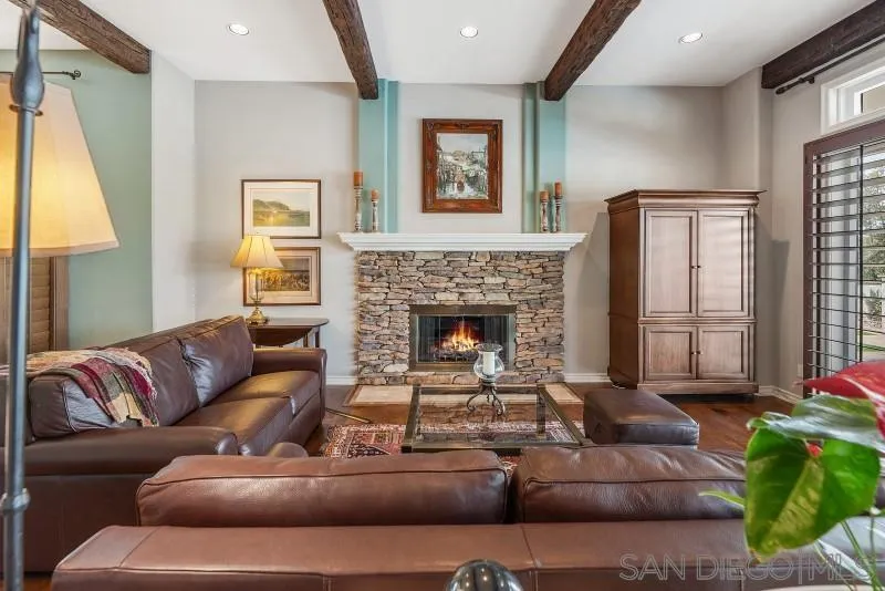 14370 Harvest Crescent Poway, CA 92064 - Photo 24 of 56 a living room with furniture window and a fireplace