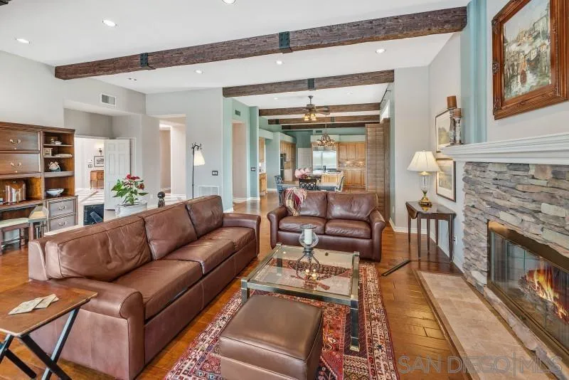 14370 Harvest Crescent Poway, CA 92064 - Photo 28 of 56 a living room with furniture and a fireplace