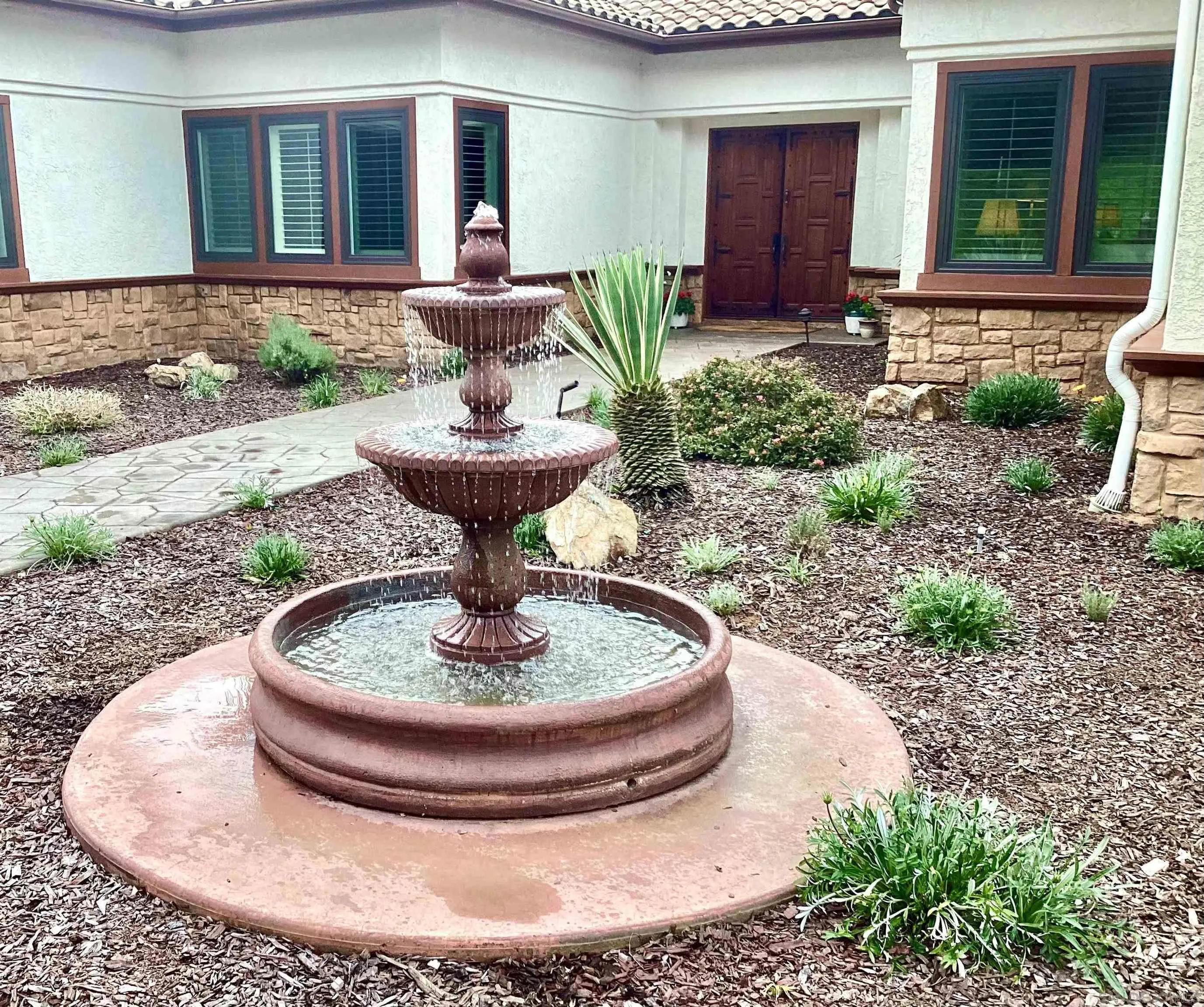 14370 Harvest Crescent Poway, CA 92064 - Photo 3 of 56 a view of a house with backyard fountain and porch