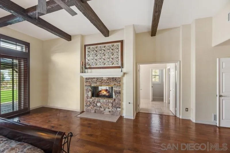14370 Harvest Crescent Poway, CA 92064 - Photo 32 of 56 a living room with furniture and a fireplace