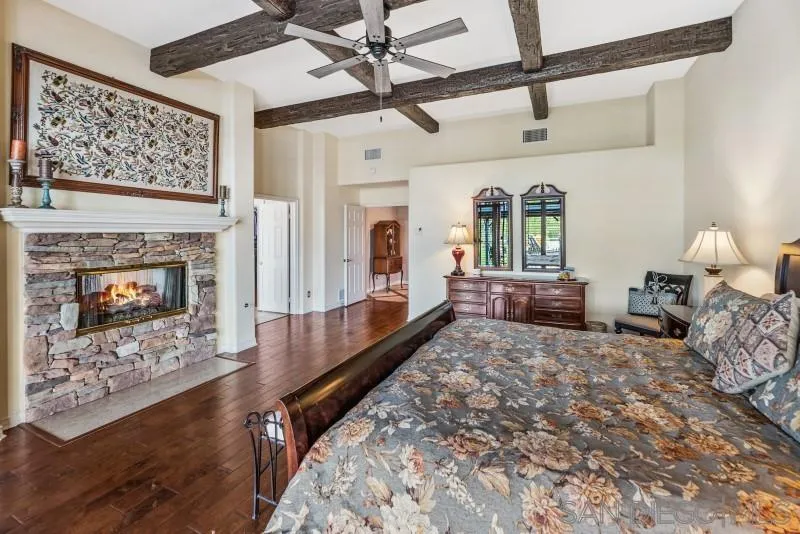14370 Harvest Crescent Poway, CA 92064 - Photo 33 of 56 a living room with furniture and a fireplace