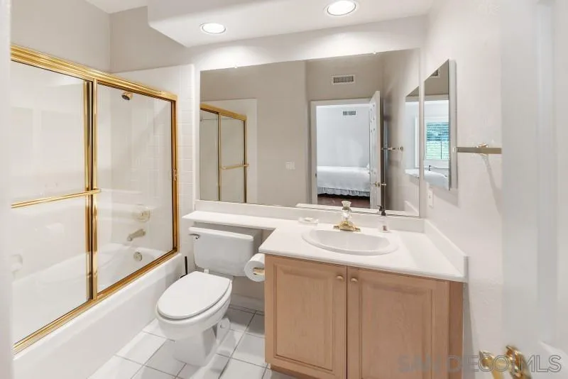 14370 Harvest Crescent Poway, CA 92064 - Photo 38 of 56 a bathroom with a sink a toilet and shower