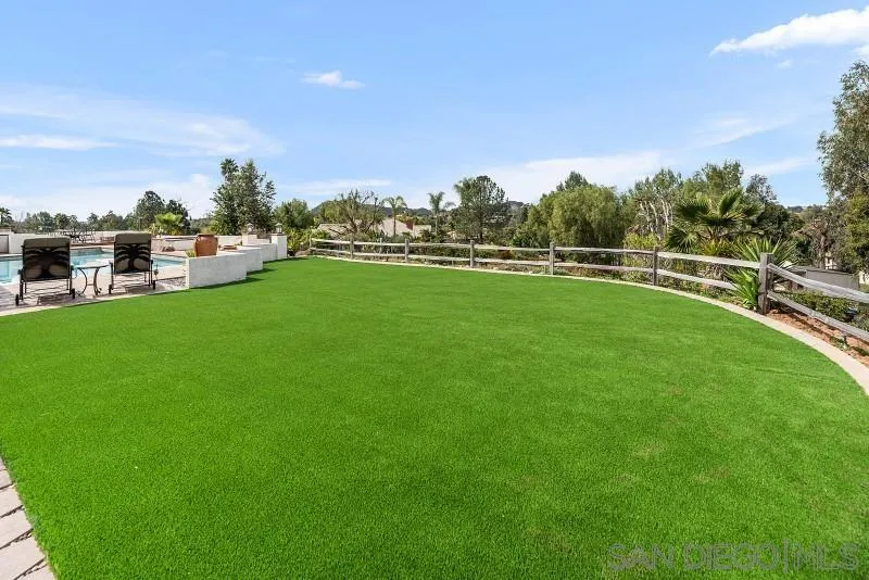 14370 Harvest Crescent Poway, CA 92064 - Photo 46 of 56 a view of a golf course with a lake