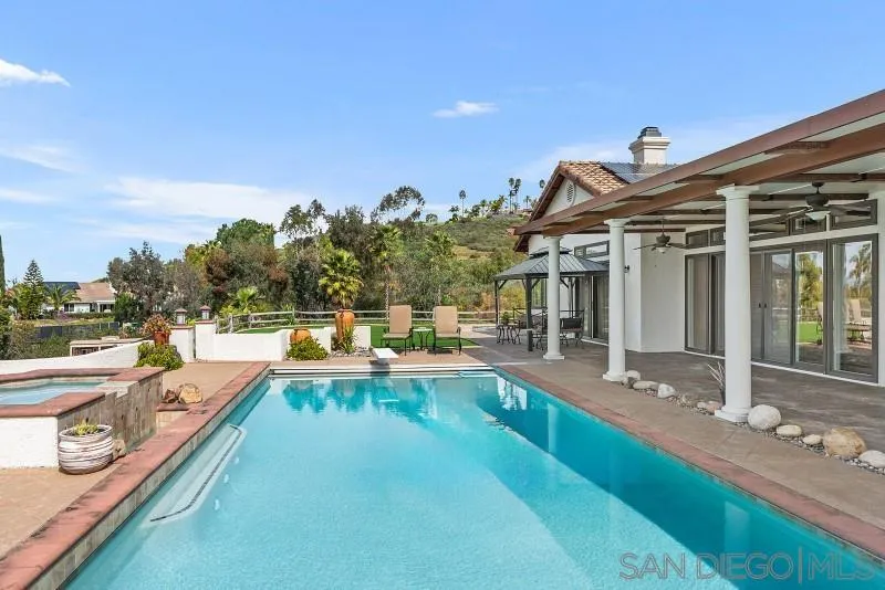14370 Harvest Crescent Poway, CA 92064 - Photo 51 of 56 a view of a house with swimming pool and sitting area