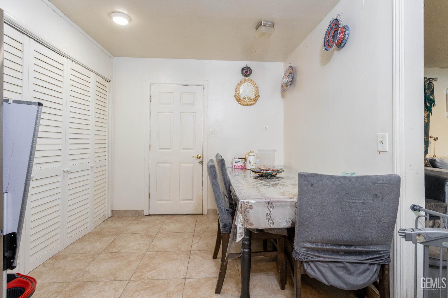 Undisclosed Address Delano, CA 93215 - Photo 13 of 35 a view of a dining room and kitchen with furniture and window