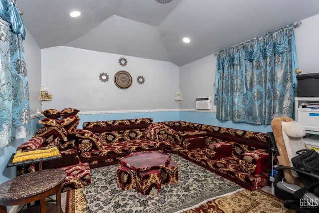 a room with furniture and wooden floor