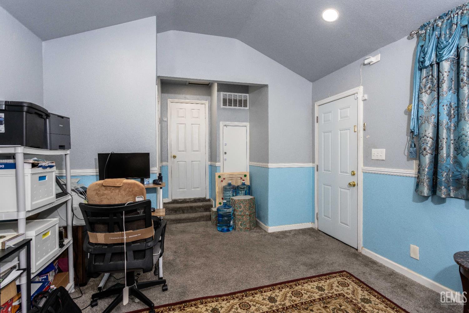 Undisclosed Address Delano, CA 93215 - Photo 15 of 35 a living room with furniture and a flat screen tv