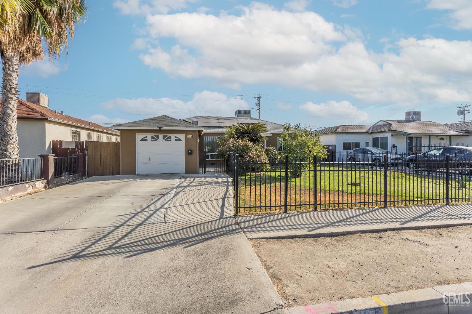Undisclosed Address Delano, CA 93215 - Photo 2 of 35 a view of a house with a outdoor space