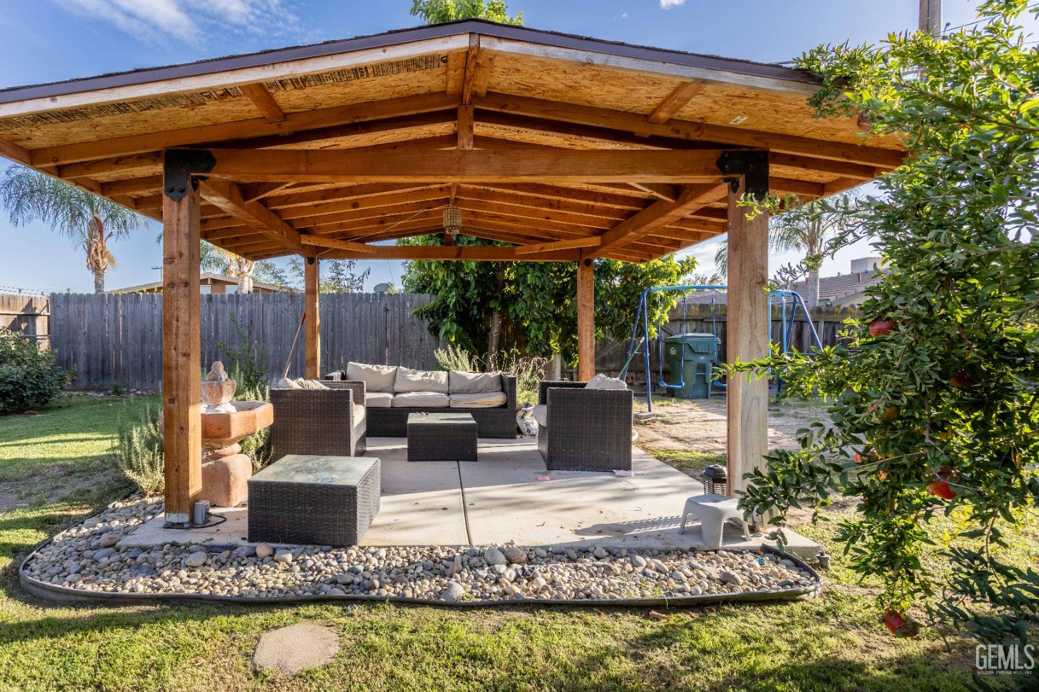 Undisclosed Address Delano, CA 93215 - Photo 33 of 35 a view of a chair and tables in the patio