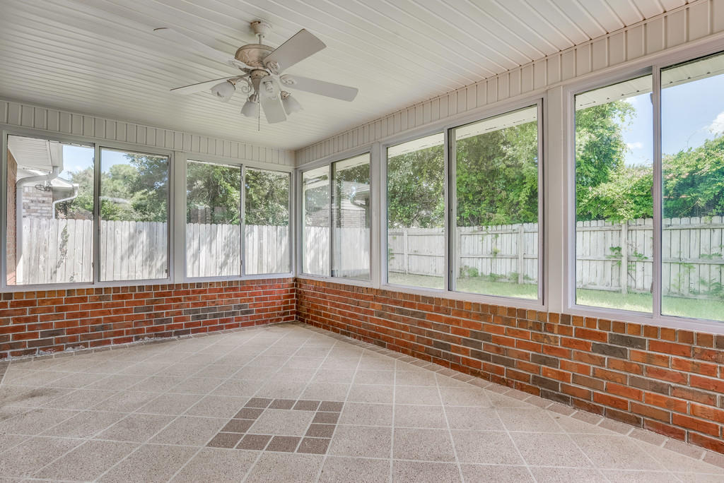 1969 Jessica Way Navarre, FL 32566 - Photo 13 of 17 a view of room with window and a ceiling fan