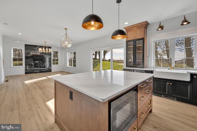 258 Weston Terrace Lititz, PA 17543 - Photo 6 of 9 an open kitchen with a stove and a wooden floor