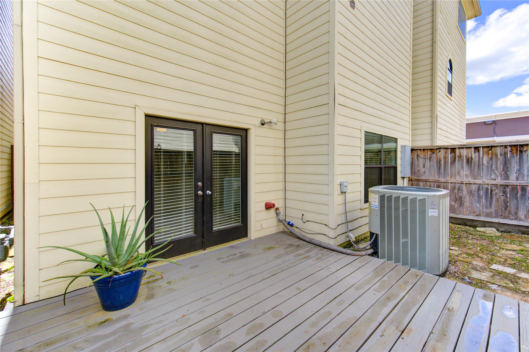 650 Westcross Street, Unit 83 Houston, TX 77018 - Photo 13 of 48 a view of a house with a deck