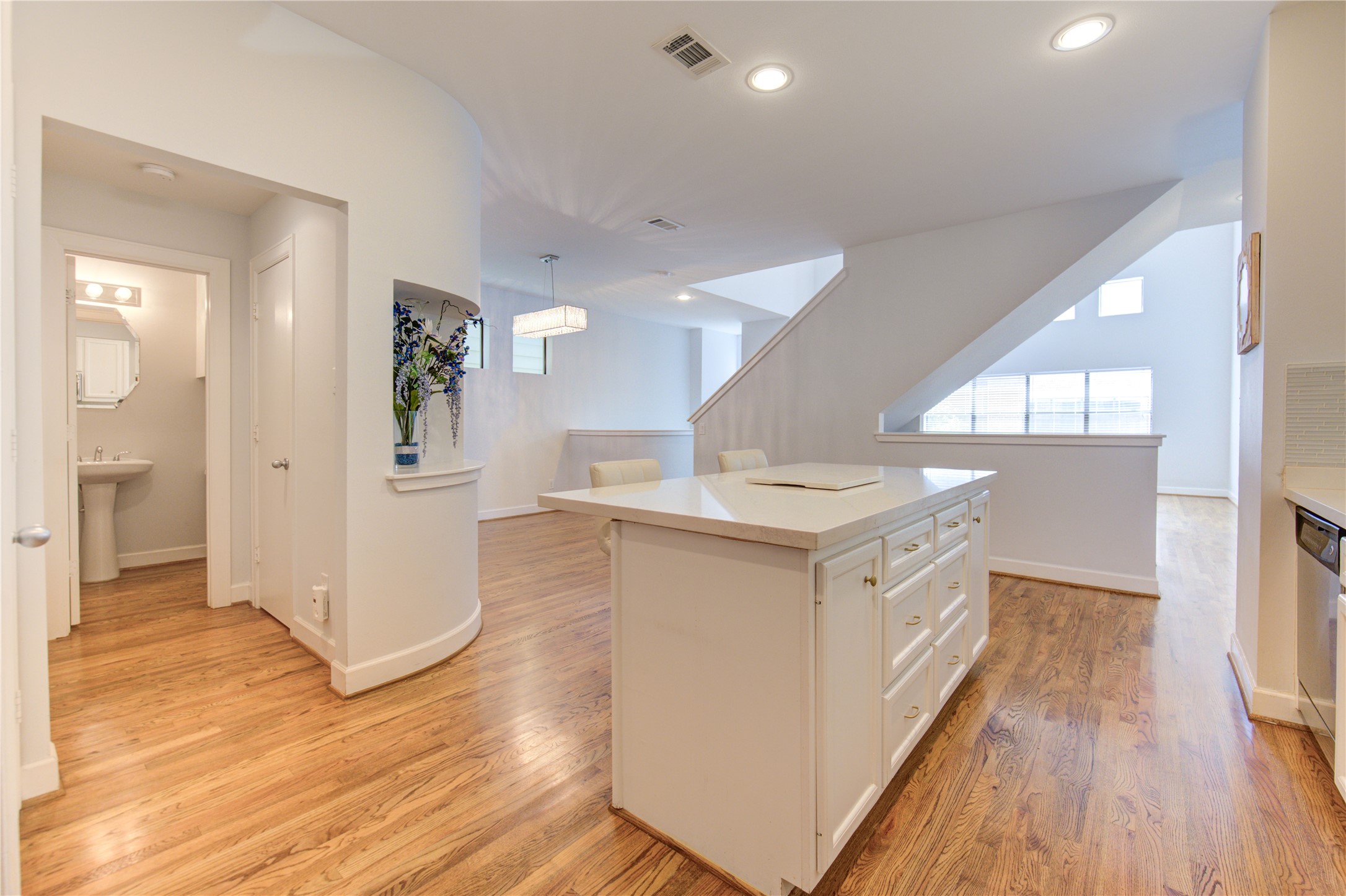 650 Westcross Street, Unit 83 Houston, TX 77018 - Photo 27 of 48 a view of a kitchen cabinets and wooden floor