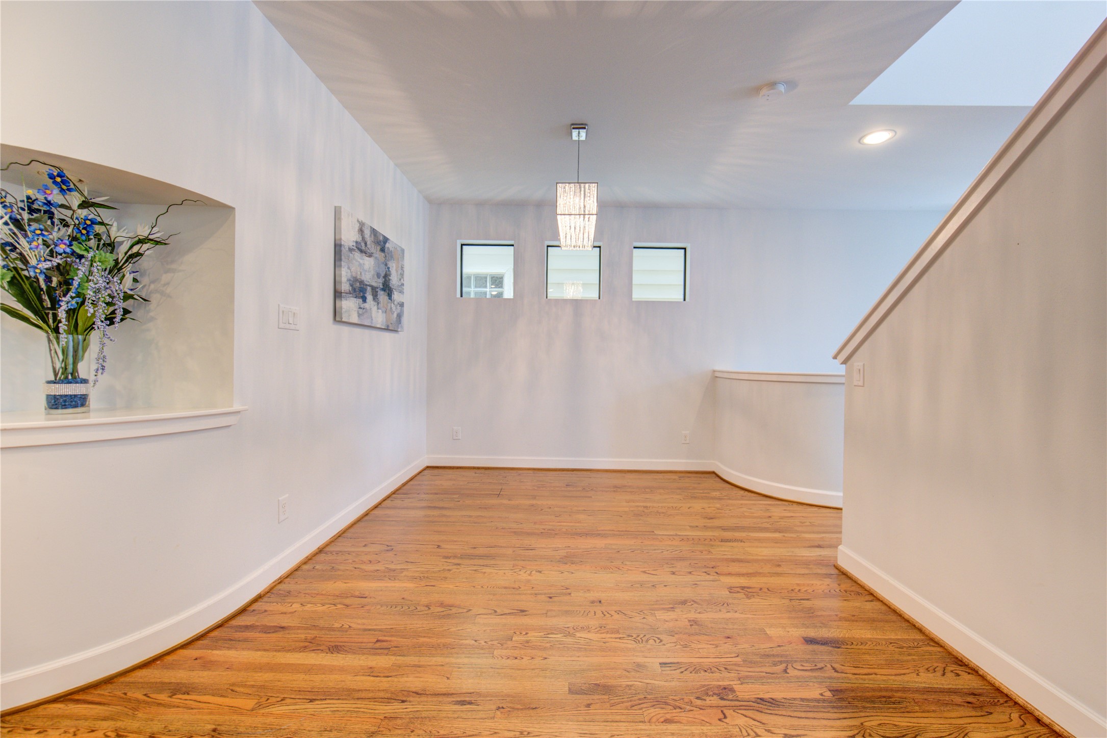 650 Westcross Street, Unit 83 Houston, TX 77018 - Photo 30 of 48 a view of empty room with wooden floor
