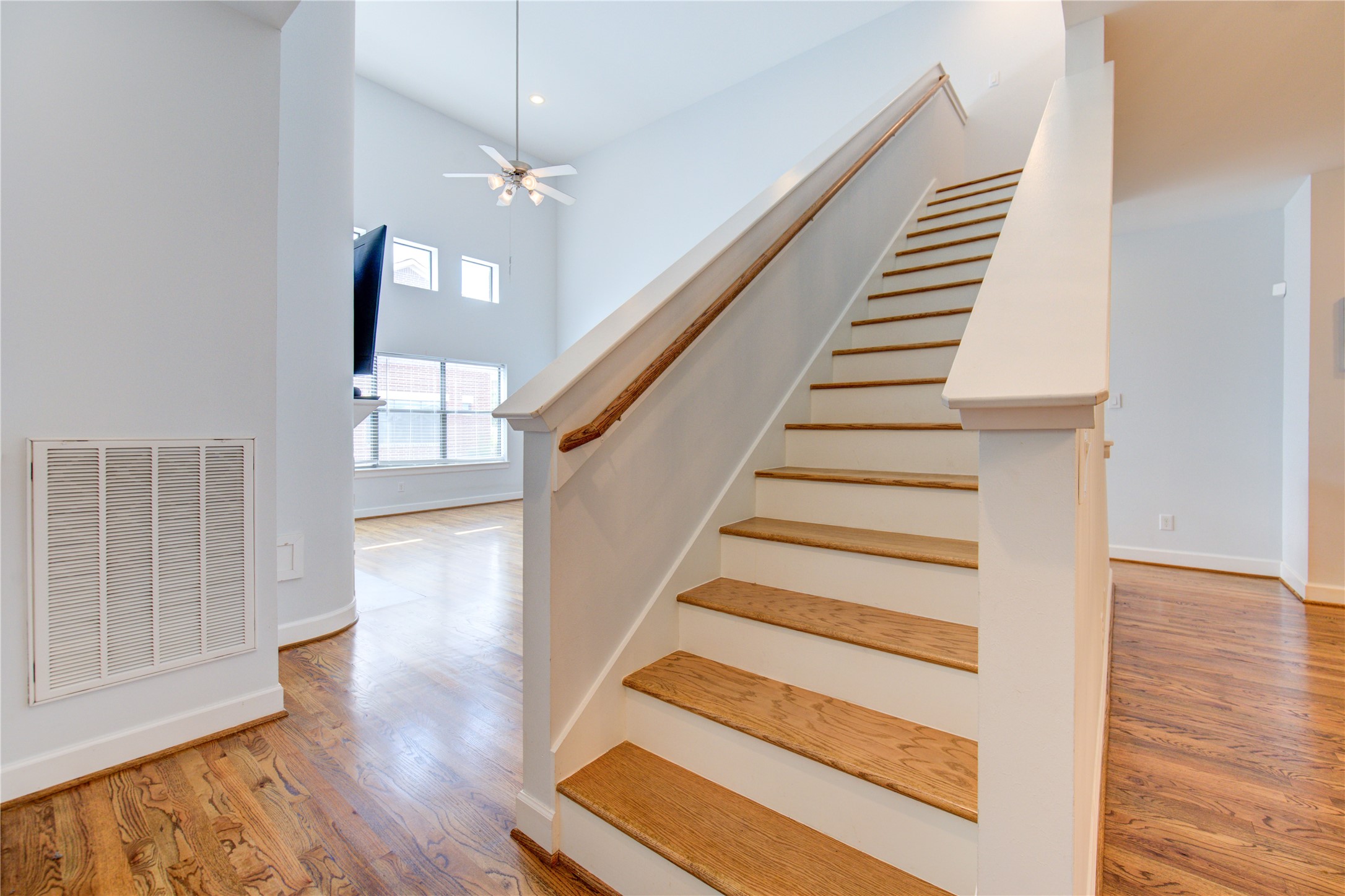 650 Westcross Street, Unit 83 Houston, TX 77018 - Photo 34 of 48 a view of entryway and hall with wooden floor