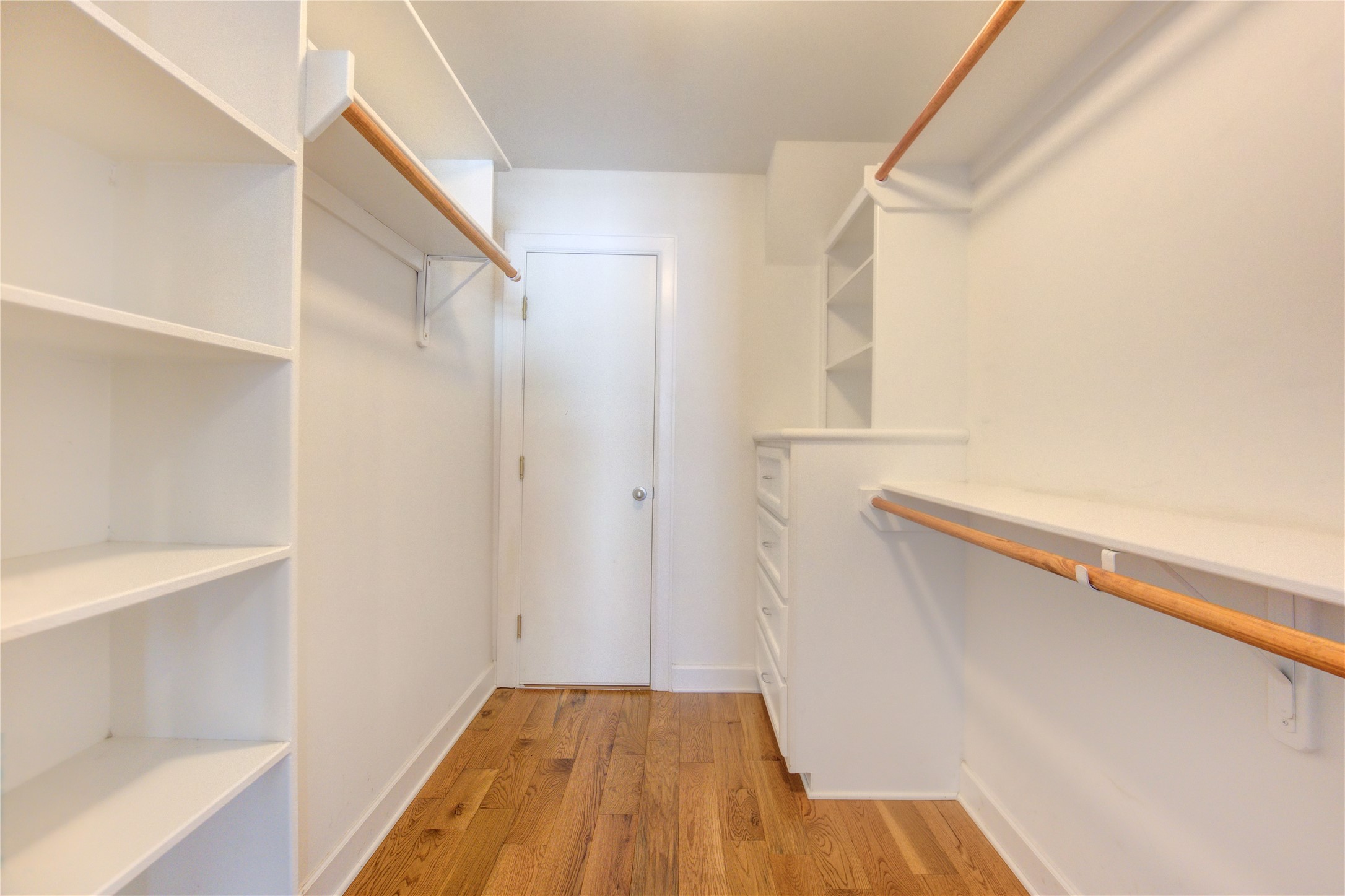 650 Westcross Street, Unit 83 Houston, TX 77018 - Photo 45 of 48 a view of walk in closet with empty racks