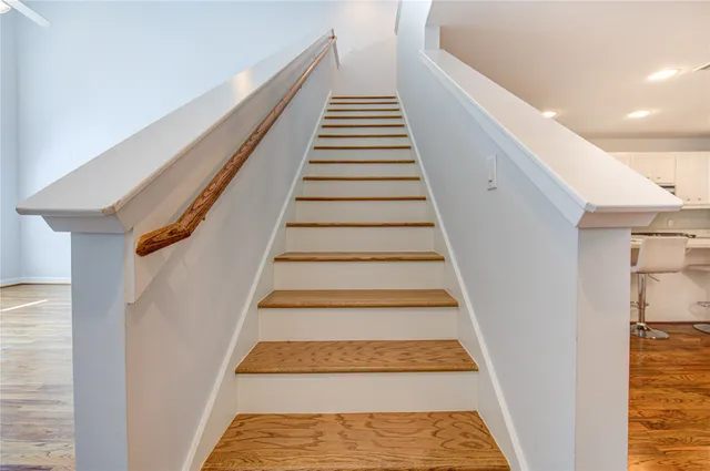 a front view of a building with a street view