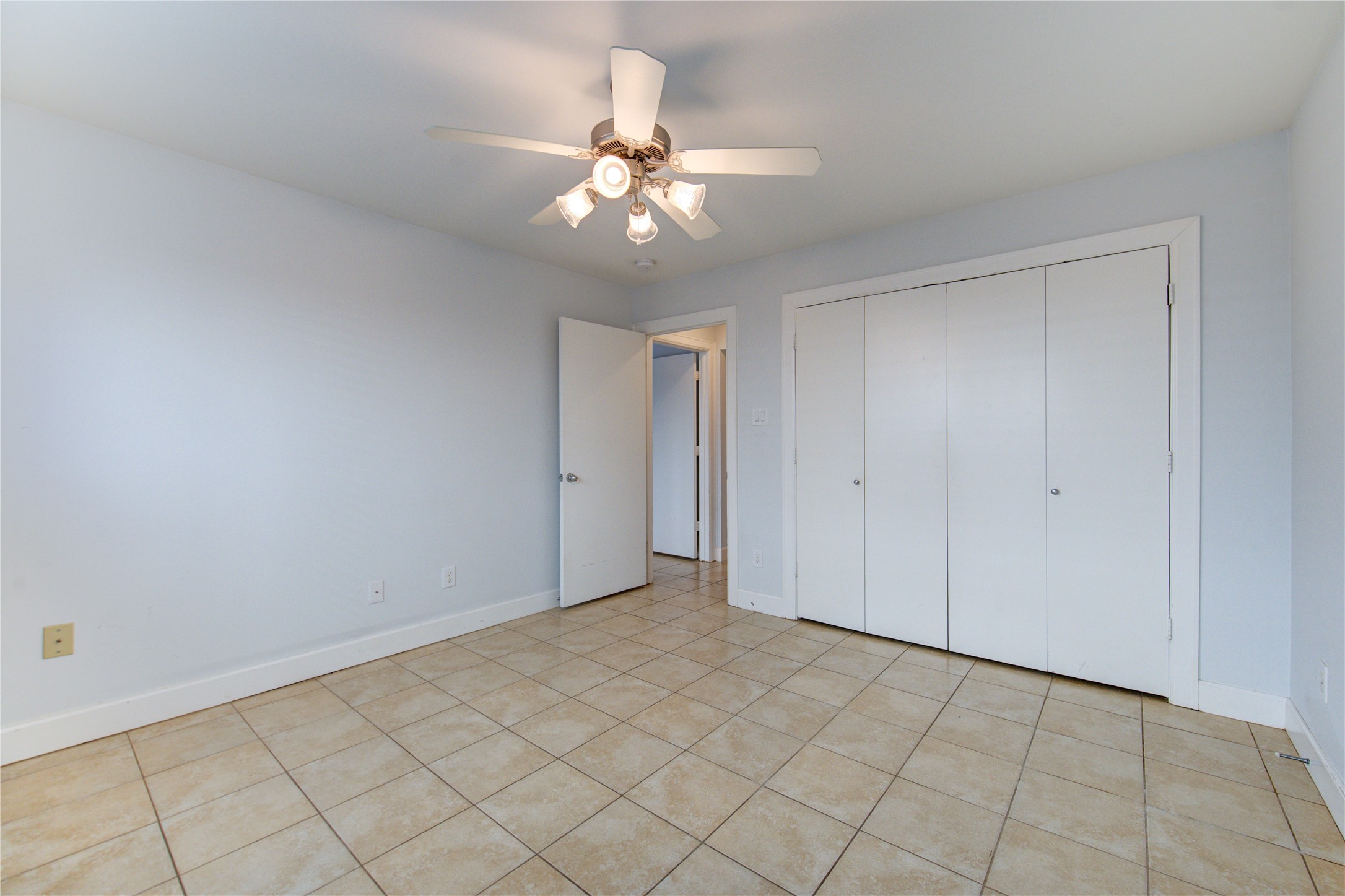 650 Westcross Street, Unit 83 Houston, TX 77018 - Photo 10 of 48 a view of an empty room with wooden floor