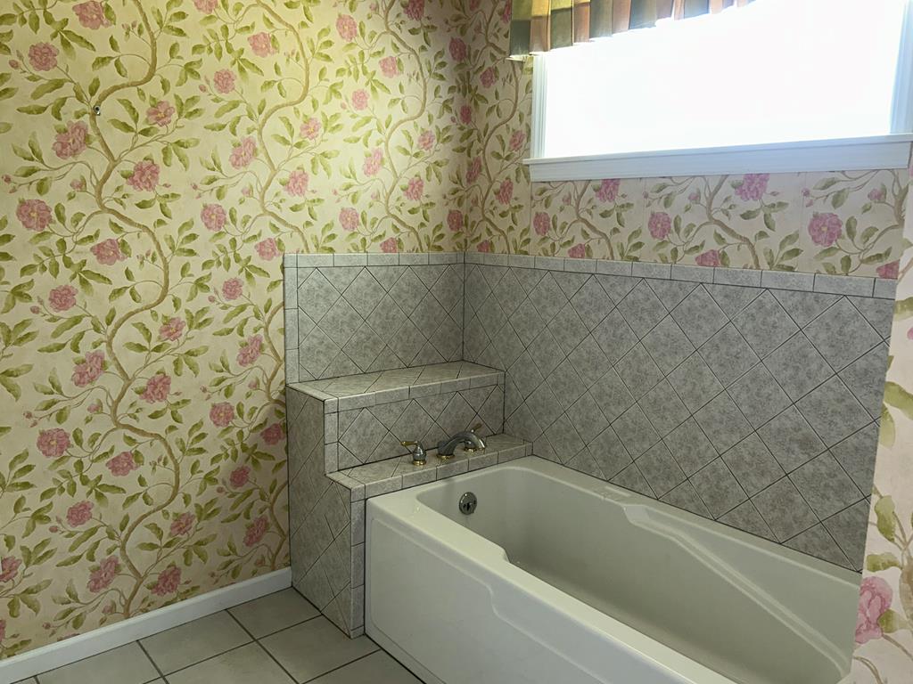 114 Oak Ridge Drive Clarion, PA 16214 - Photo 22 of 38 a bathroom with a bathtub and shower