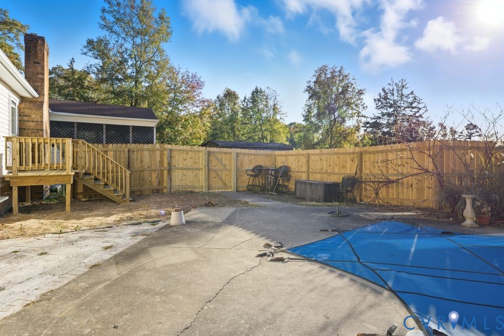 1601 Holly Hills Road Powhatan, VA 23139 - Photo 31 of 32 View of swimming pool with a patio, a fenced backy
