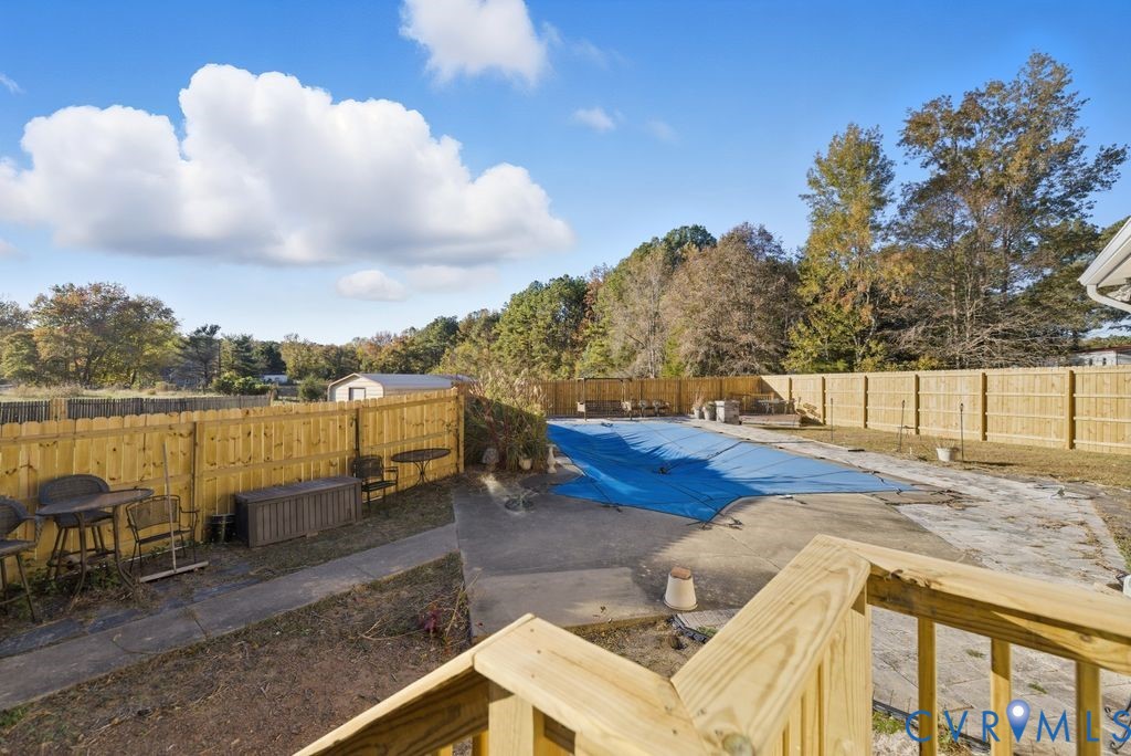 1601 Holly Hills Road Powhatan, VA 23139 - Photo 32 of 32 View of swimming pool with a fenced backyard and a