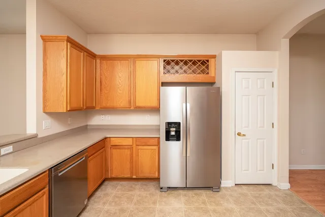 a bathroom with a tub shower and sink