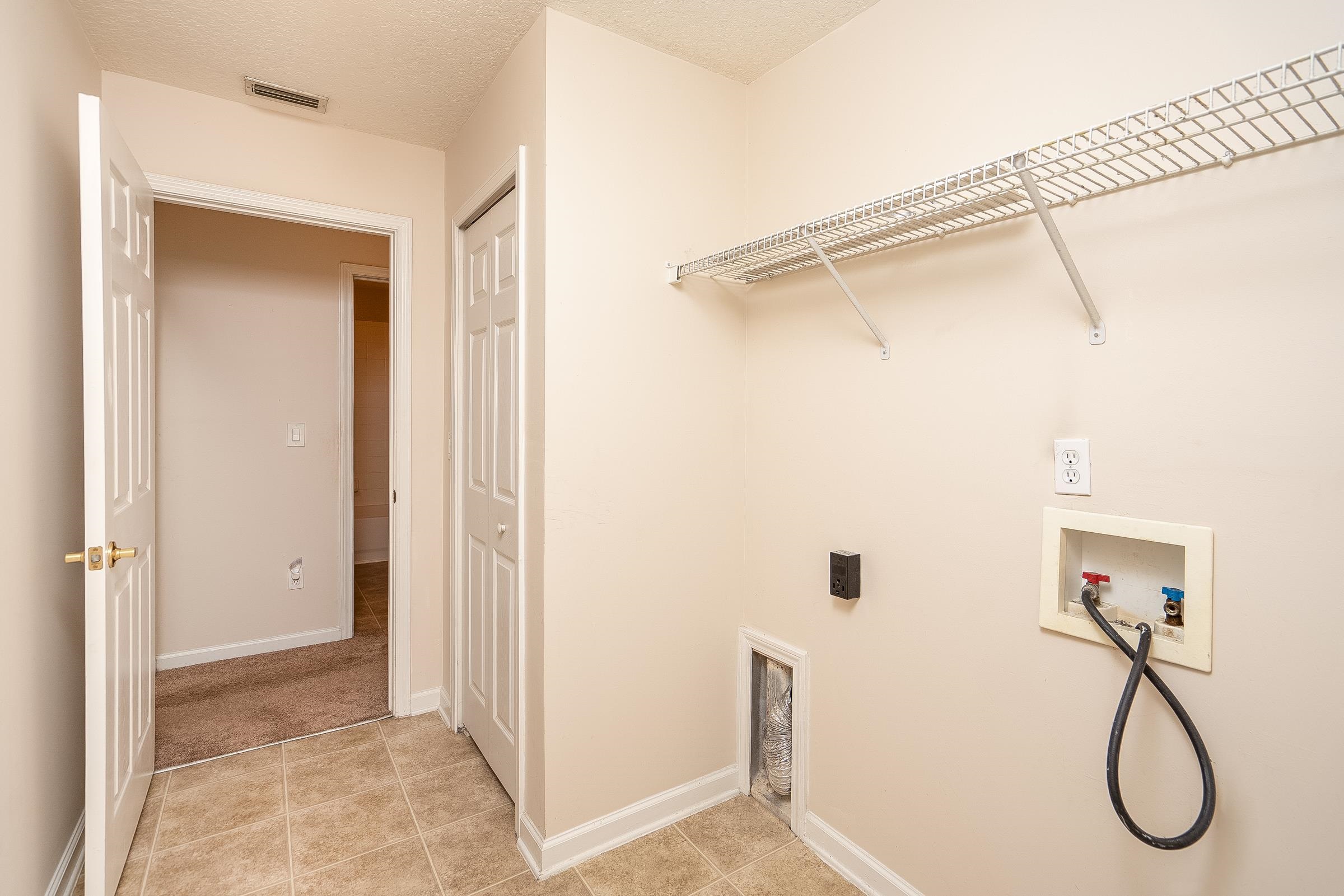 1525 Remington Way St. Augustine, FL 32084 - Photo 34 of 51 a bathroom with a glass shower door