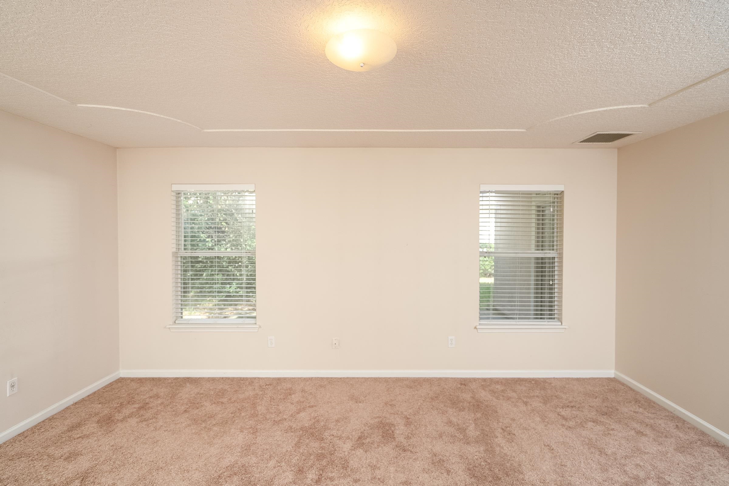 1525 Remington Way St. Augustine, FL 32084 - Photo 35 of 51 an empty room with windows