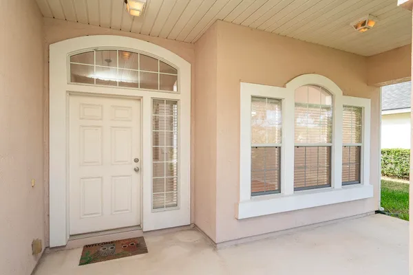 a view of a kitchen from the hallway