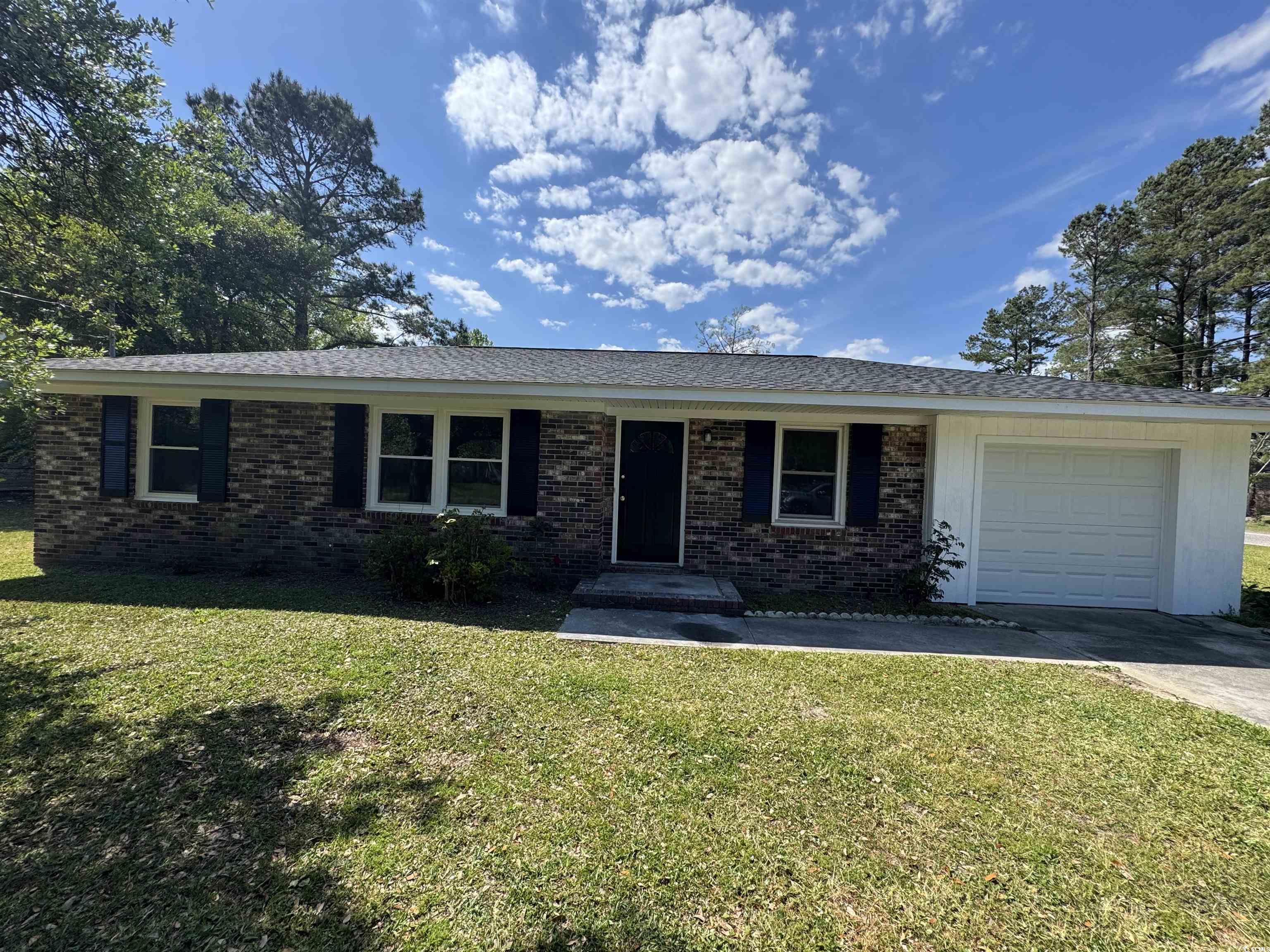 333 Whites Creek Road Georgetown, SC 29440 - Photo 1 of 13 Ranch-style home featuring a front lawn, brick sid