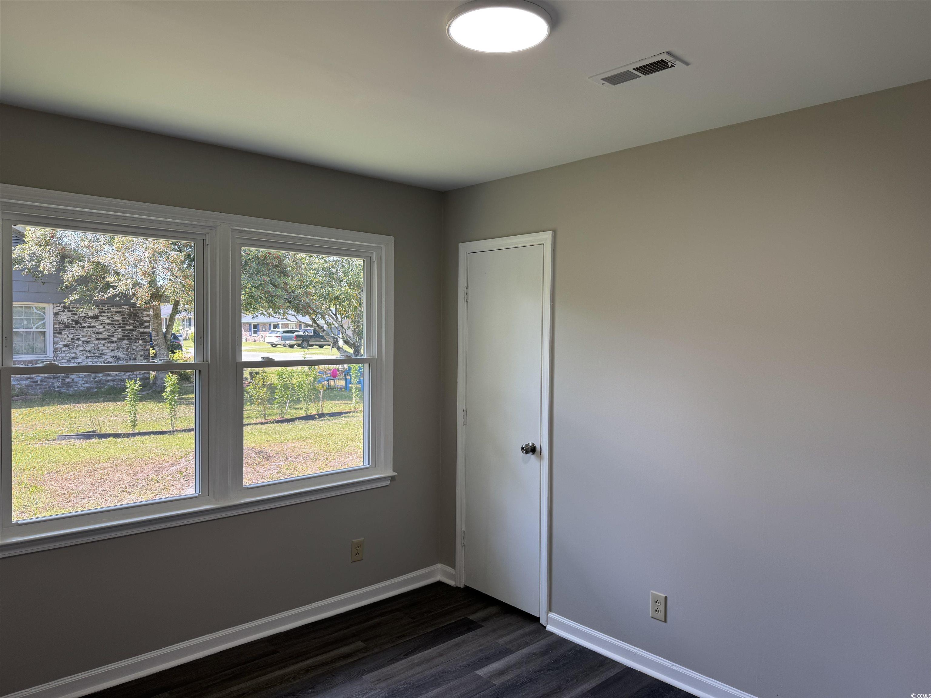 333 Whites Creek Road Georgetown, SC 29440 - Photo 10 of 13 Spare room featuring baseboards, visible vents, an