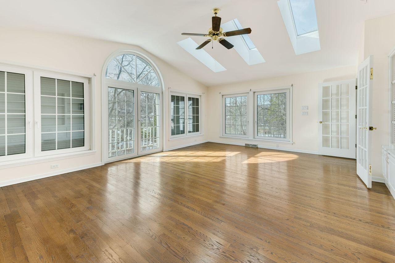 3030 South 130th Street New Berlin, WI 53151 - Photo 9 of 17 Bright and spacious sunroom filled with natural light.