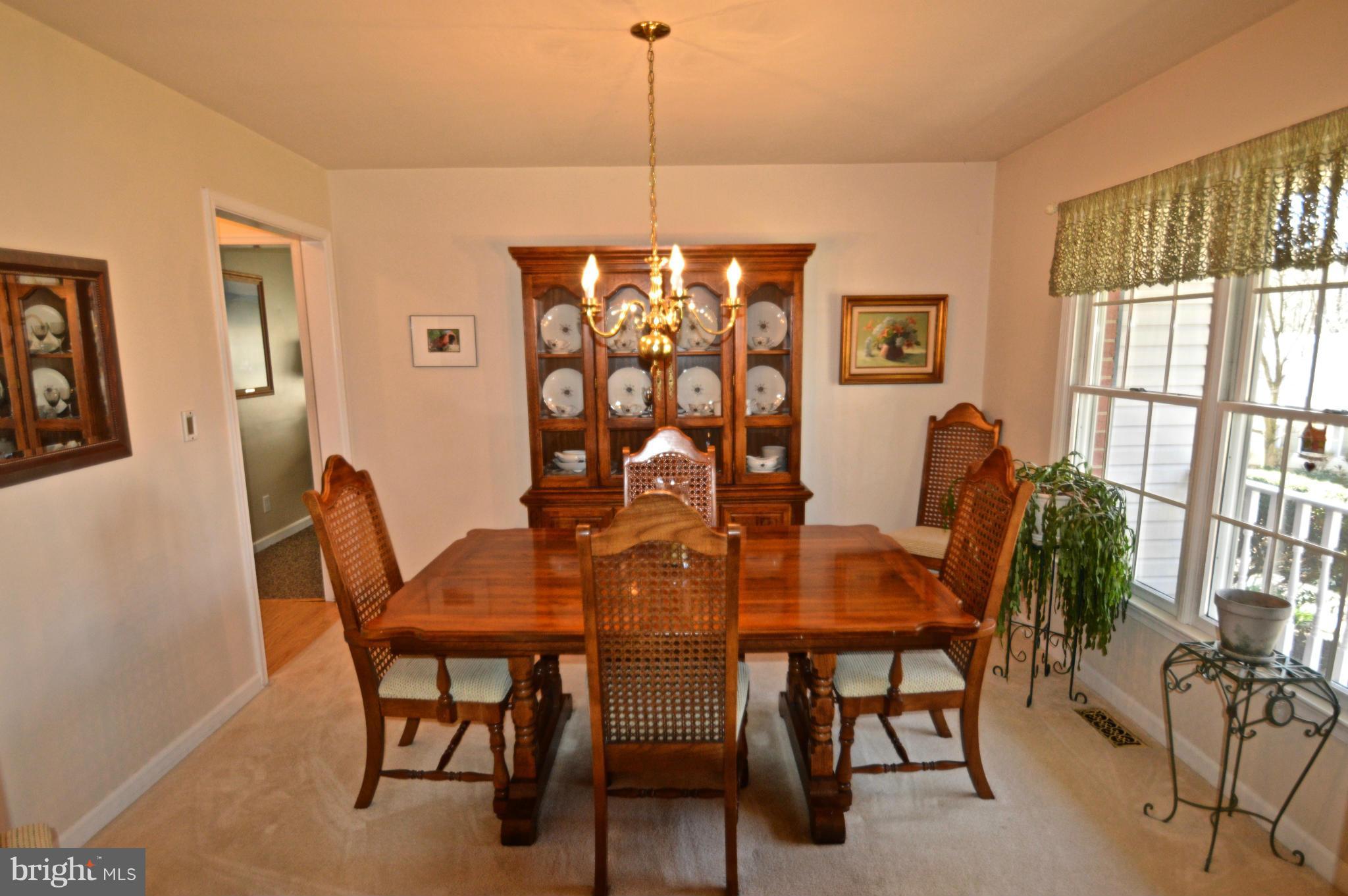 3800 Roop Road New Windsor, MD 21776 - Photo 13 of 29 a view of a dining room with furniture window and outside view