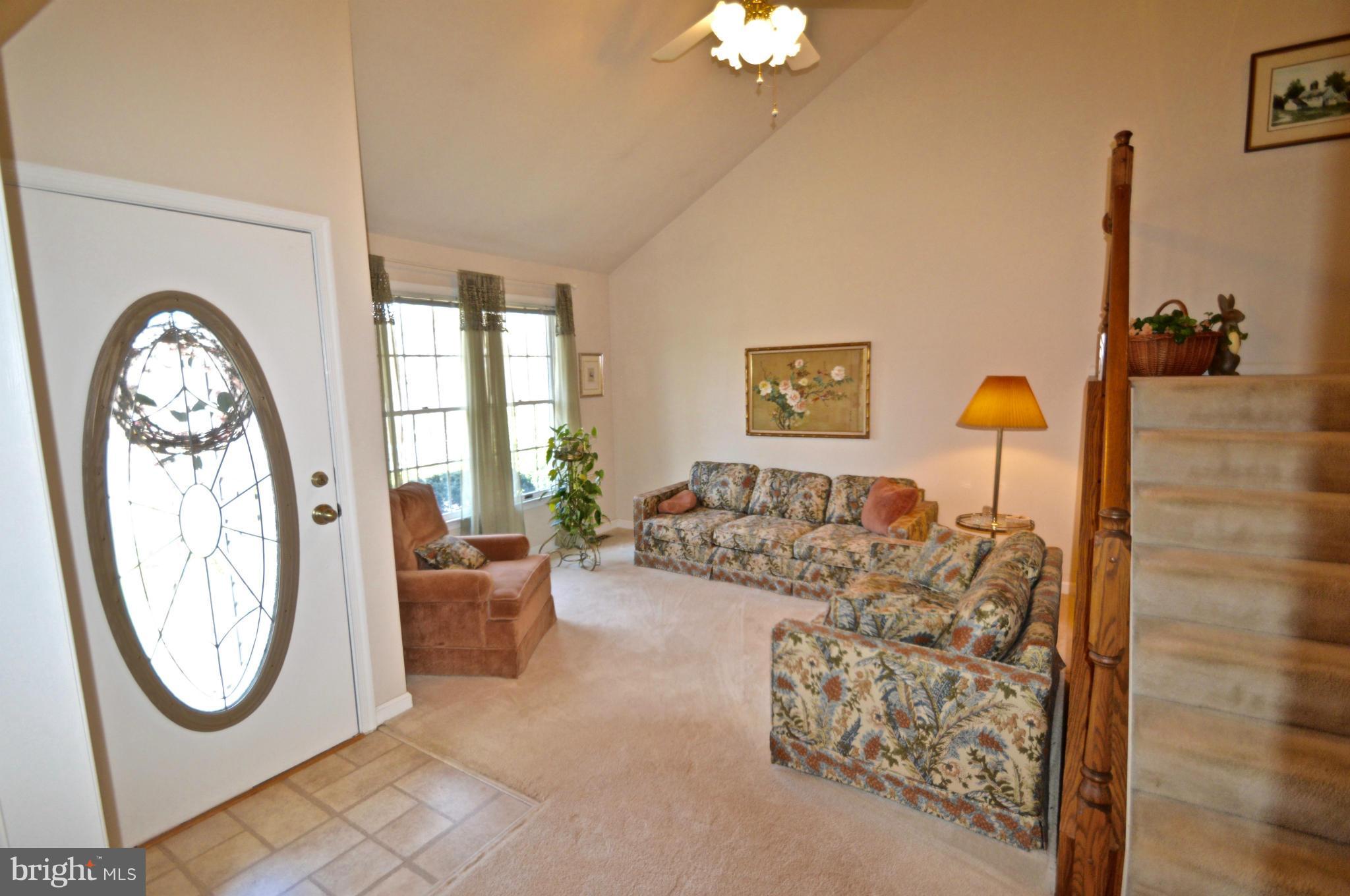 3800 Roop Road New Windsor, MD 21776 - Photo 14 of 29 a living room with furniture and a fireplace