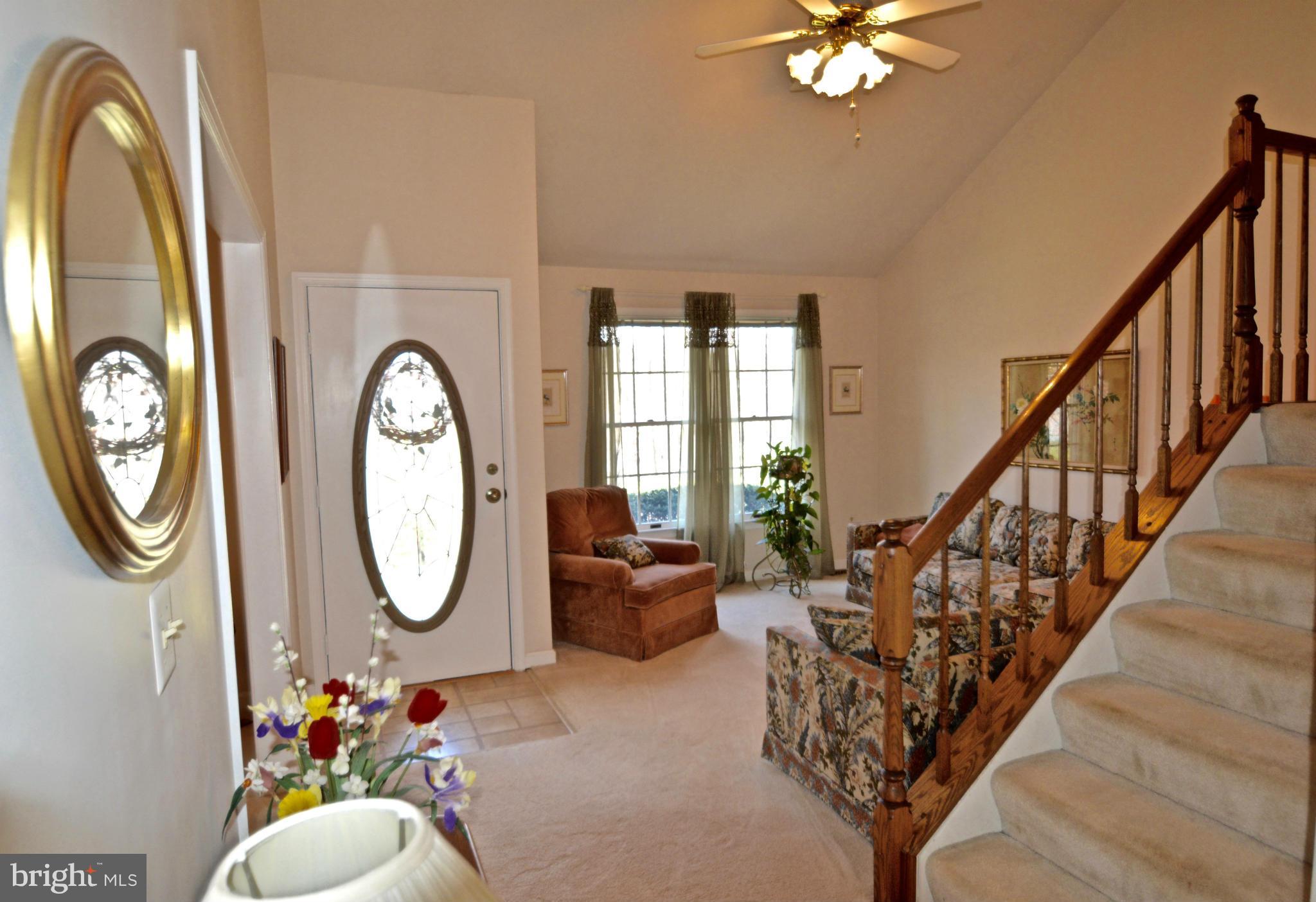 3800 Roop Road New Windsor, MD 21776 - Photo 15 of 29 a living room with furniture and a mirror