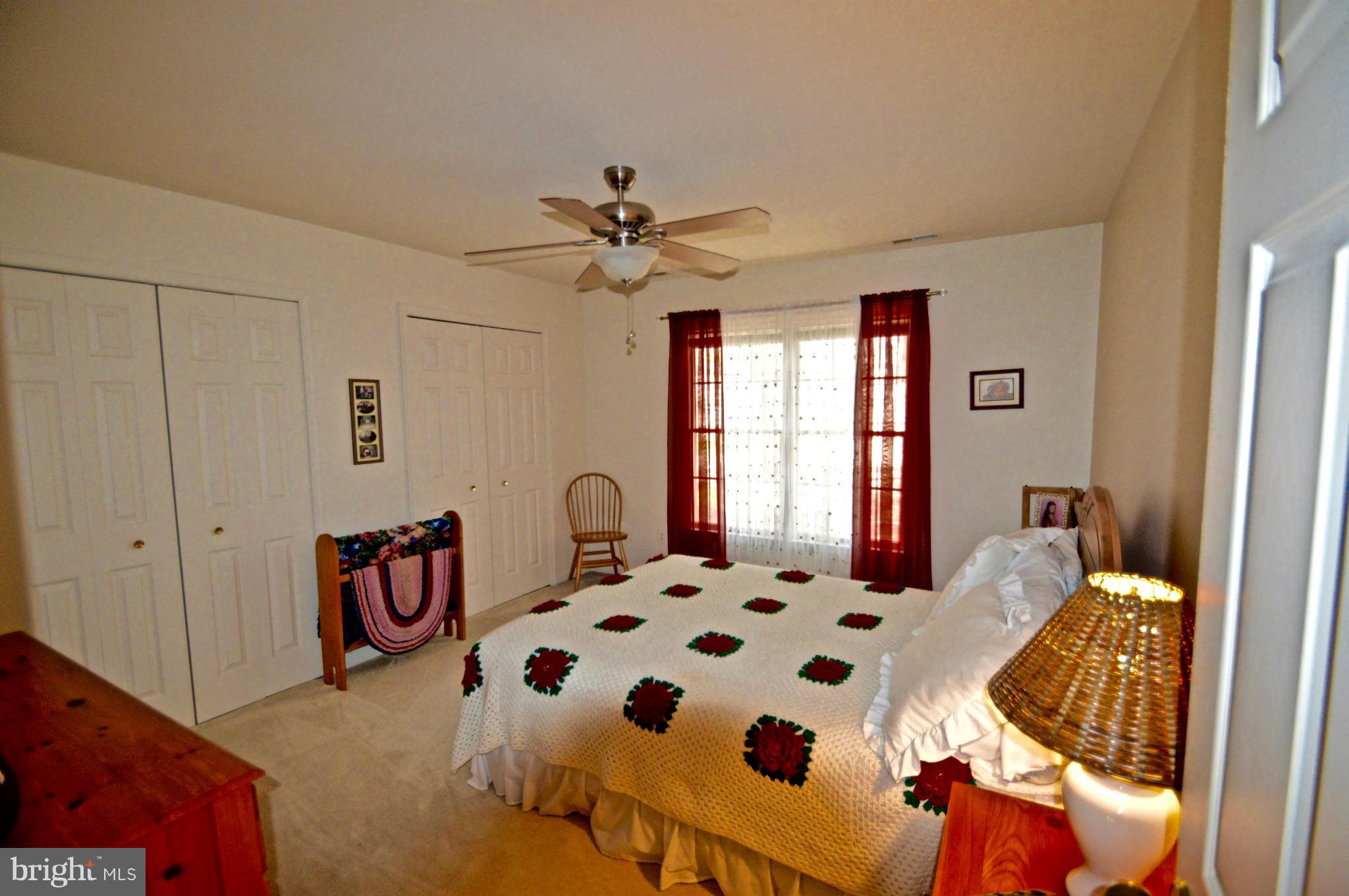 3800 Roop Road New Windsor, MD 21776 - Photo 18 of 29 a bedroom with furniture and windows