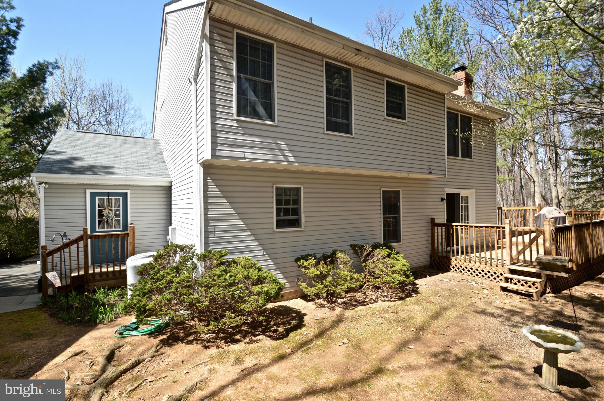 3800 Roop Road New Windsor, MD 21776 - Photo 26 of 29 a view of a house with a yard and sitting area