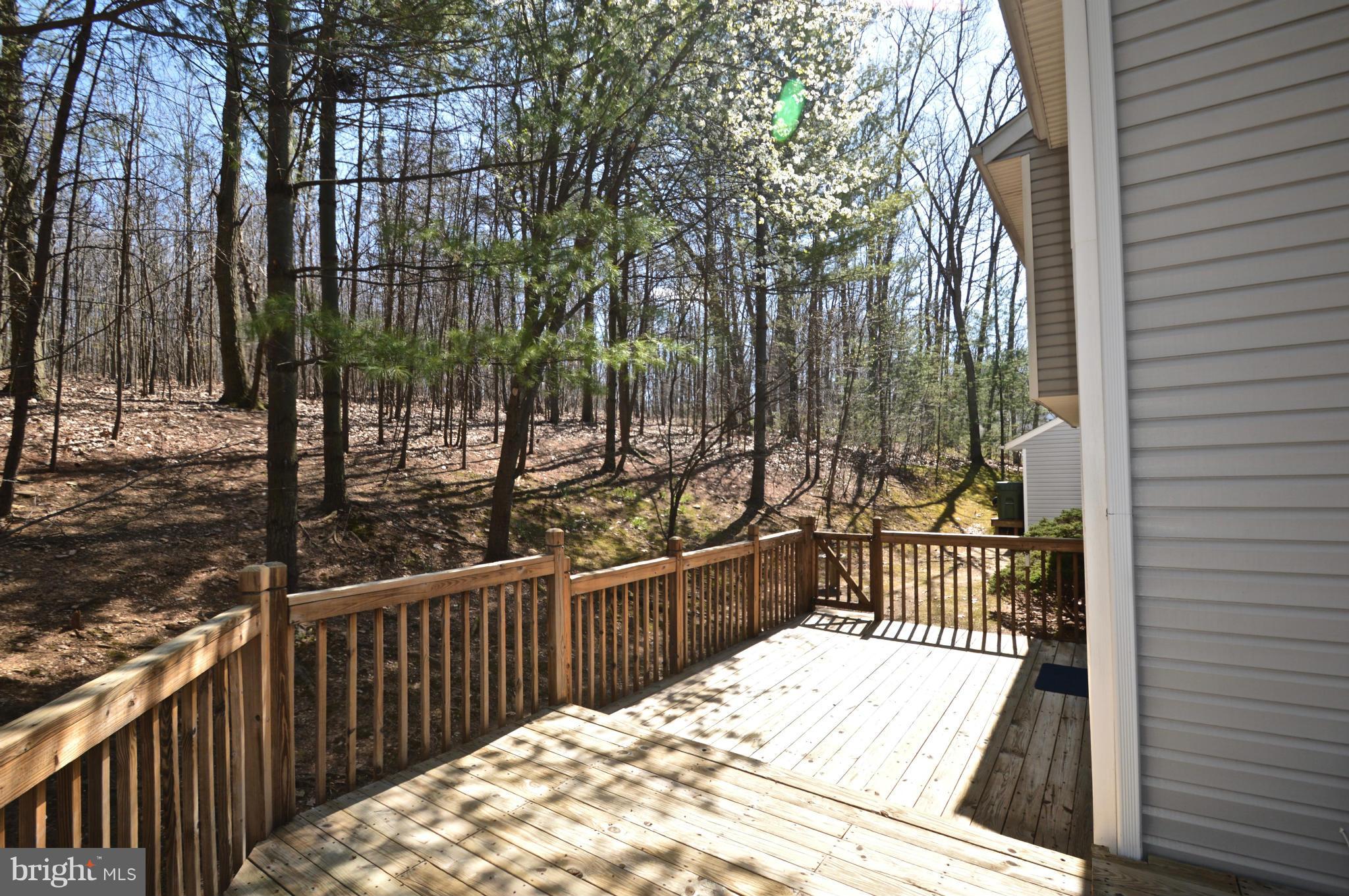 3800 Roop Road New Windsor, MD 21776 - Photo 28 of 29 a view of balcony with wooden floor and fence