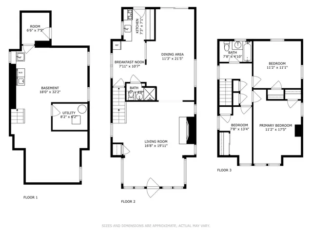 a view of a white building with many windows