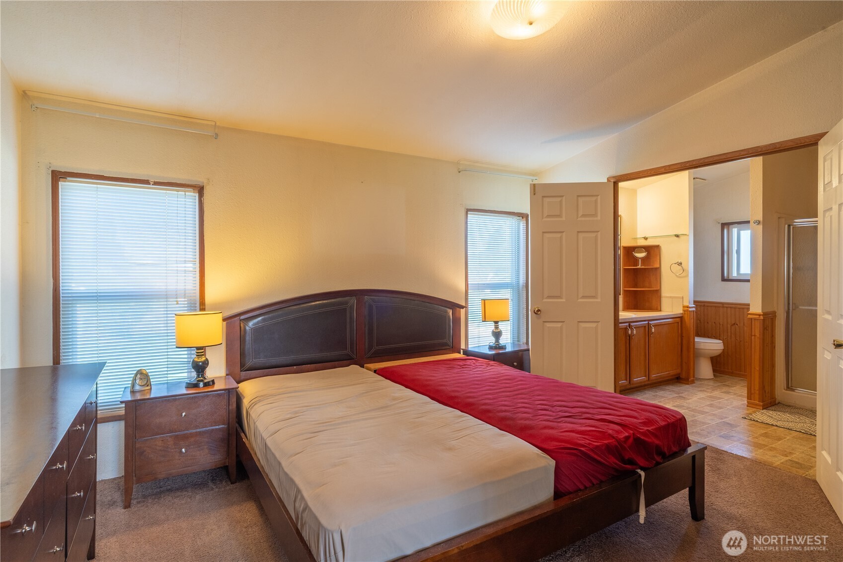 4331 Rd K 2 Street Northeast Moses Lake, WA 98837 - Photo 17 of 38 a bedroom with a bed and wooden floor