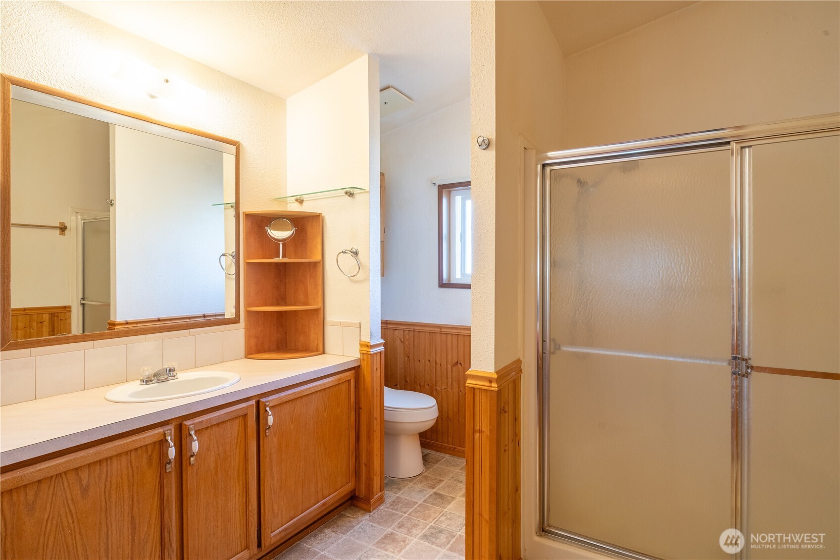 4331 Rd K 2 Street Northeast Moses Lake, WA 98837 - Photo 20 of 38 a bathroom with a double vanity sink toilet and shower