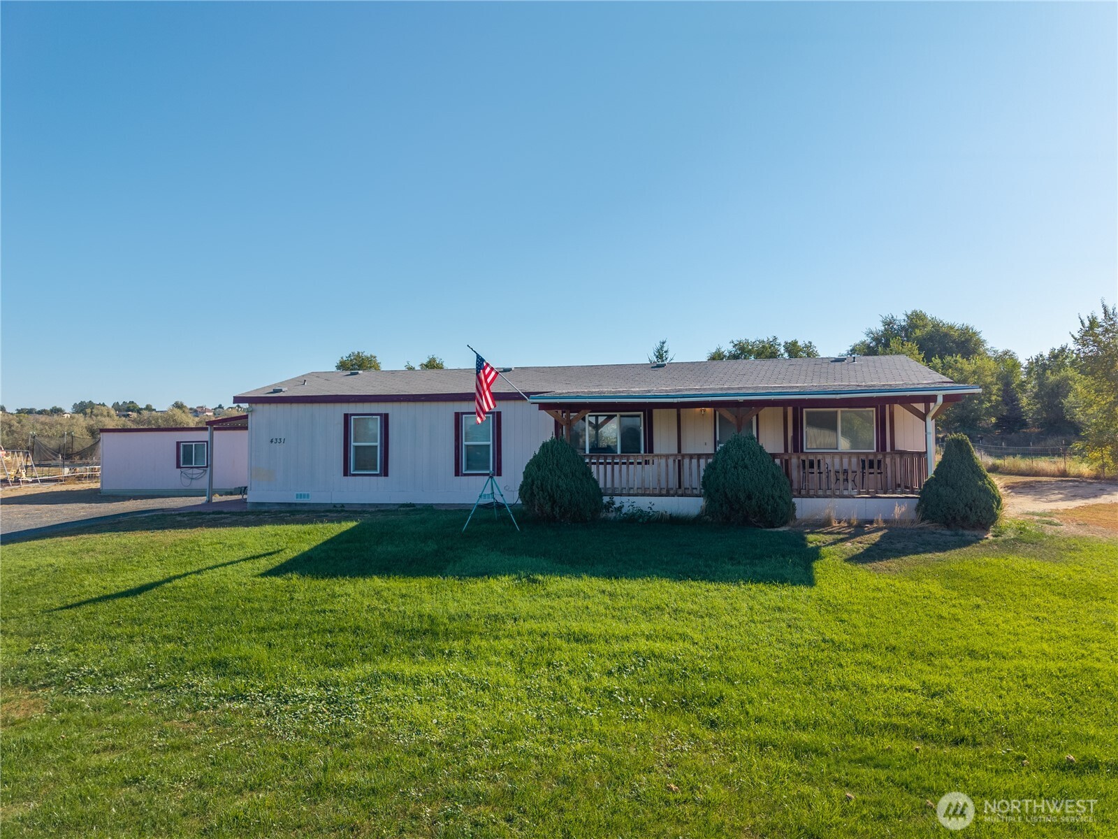 4331 Rd K 2 Street Northeast Moses Lake, WA 98837 - Photo 2 of 38 a view of a house with a yard balcony