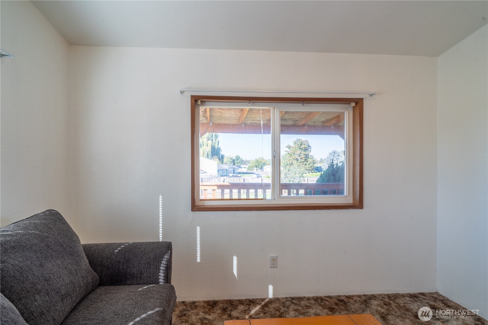 4331 Rd K 2 Street Northeast Moses Lake, WA 98837 - Photo 25 of 38 a living room with furniture and a window