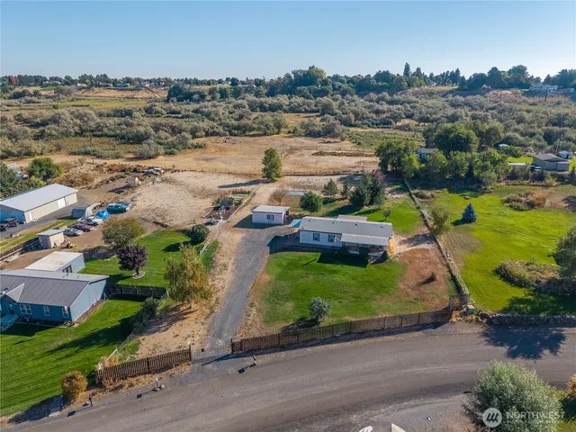 an aerial view of a house with a garden