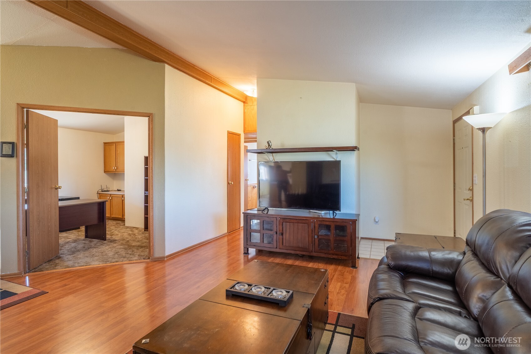 4331 Rd K 2 Street Northeast Moses Lake, WA 98837 - Photo 9 of 38 a living room with furniture and a flat screen tv