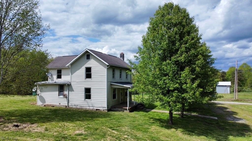 1051 Welch Road Cutler, OH 45724 - Photo 2 of 7 Side View of Farmhouse