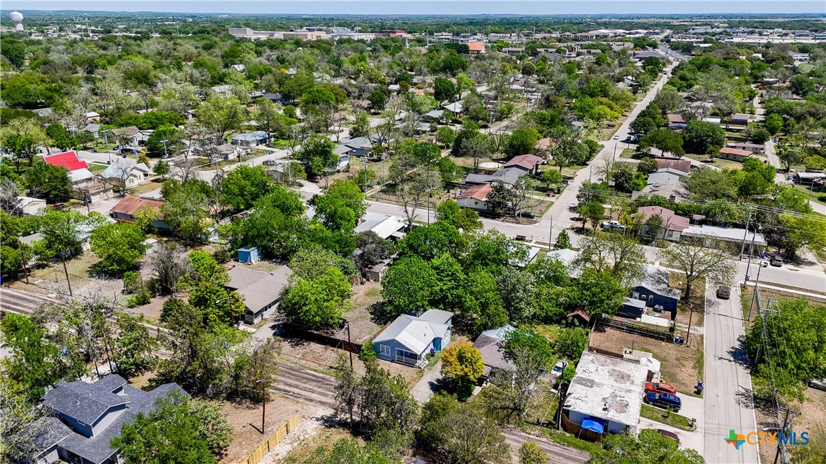 411 Ellis Street Seguin, TX 78155 - Photo 27 of 28 an aerial view of residential houses with outdoor space and trees all around