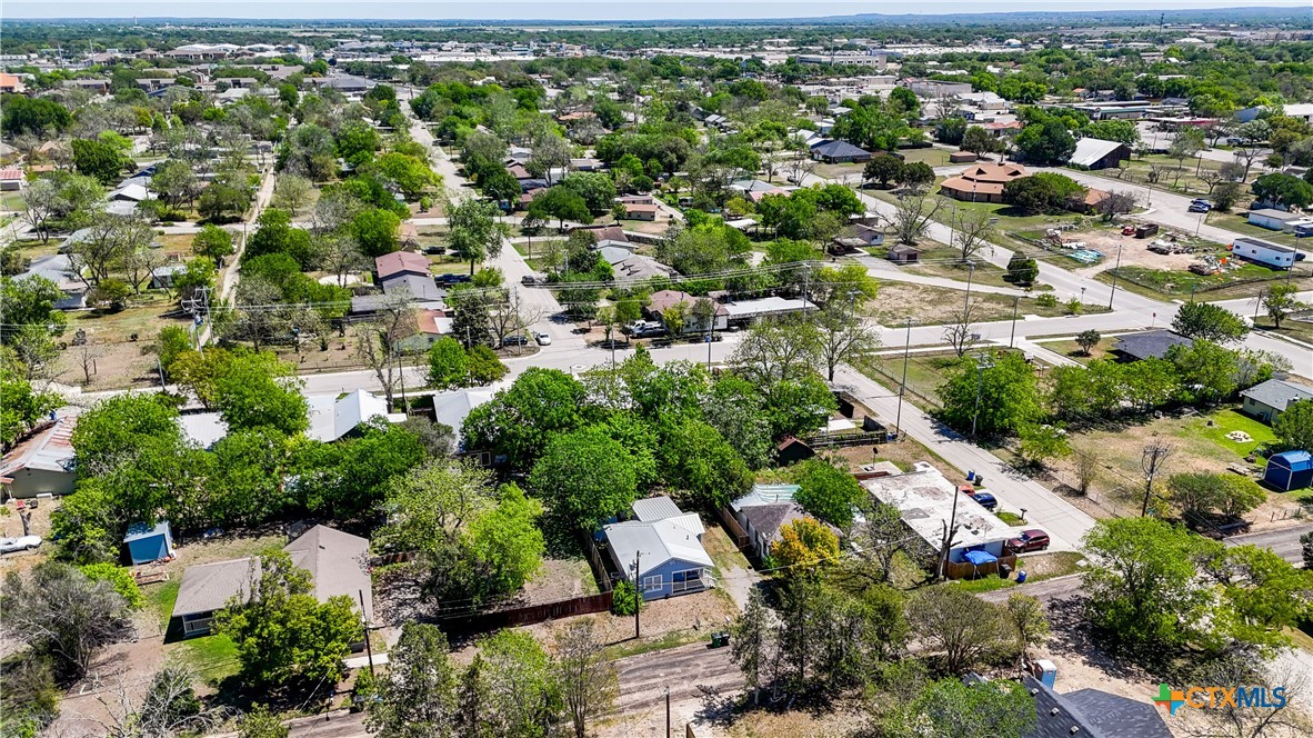 411 Ellis Street Seguin, TX 78155 - Photo 28 of 28 an aerial view of residential houses with outdoor space and trees